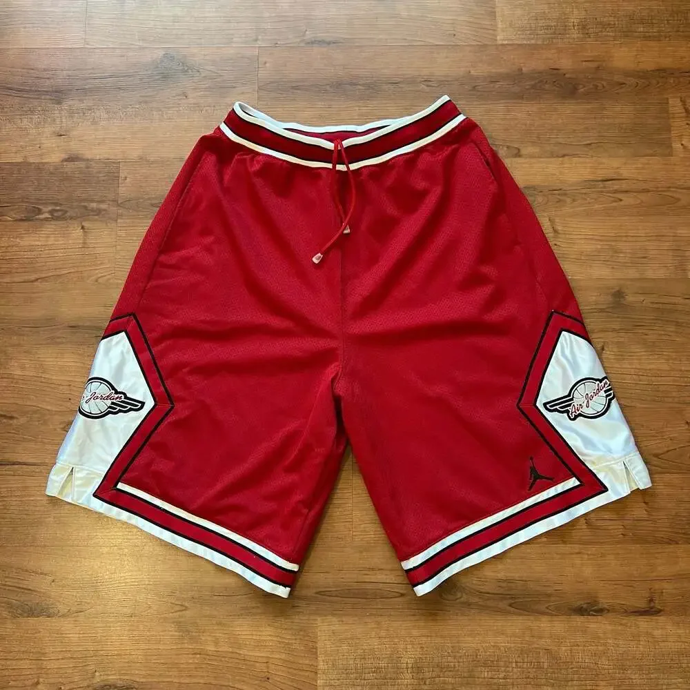 Vintage 80s/90s OG Air Jordan Wings Mesh Basketball Shorts Red & White Size L